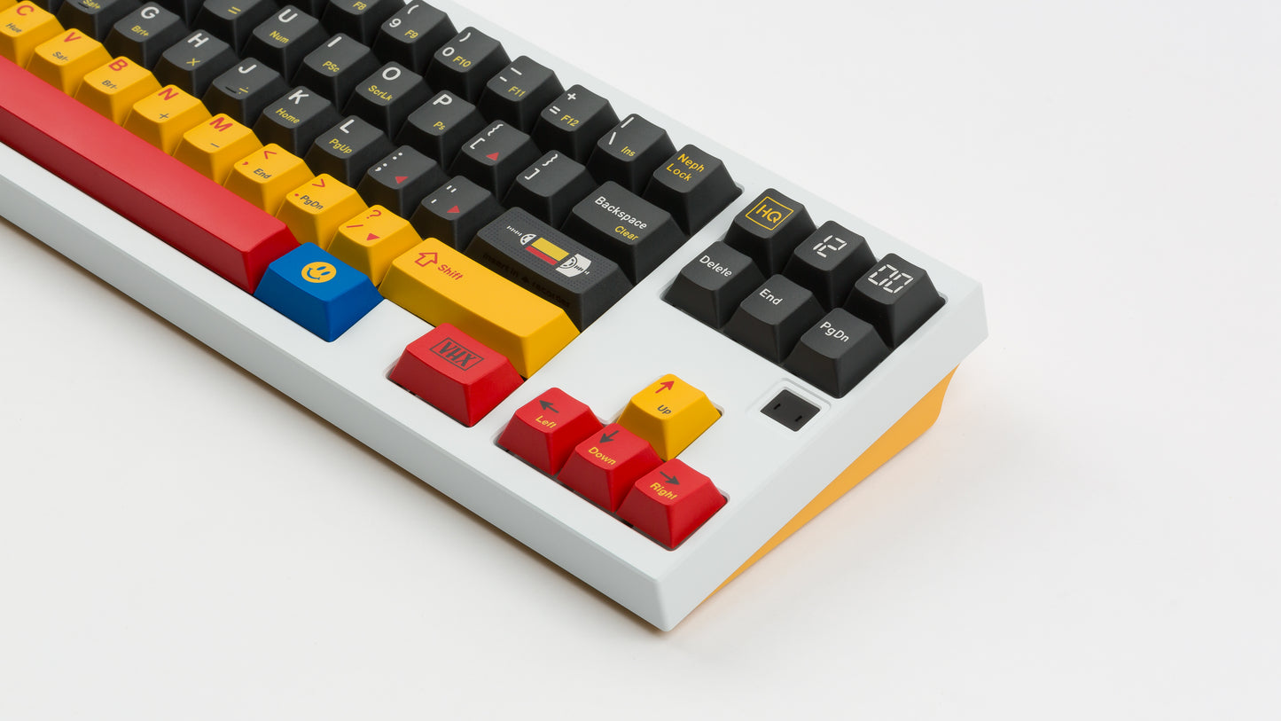 gmk cyl rewind on a white keyboard with yellow bottom