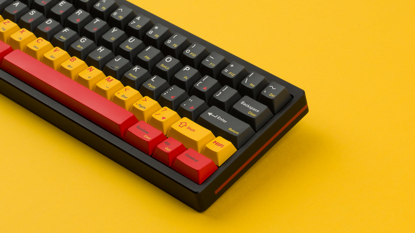 gmk cyl rewind on a black keyboard close up on right side angled